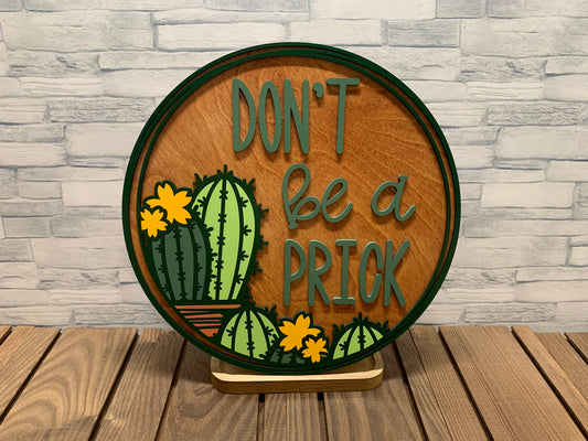 Don't Be A Prick - Round Wood Door Hanger Wall Sign